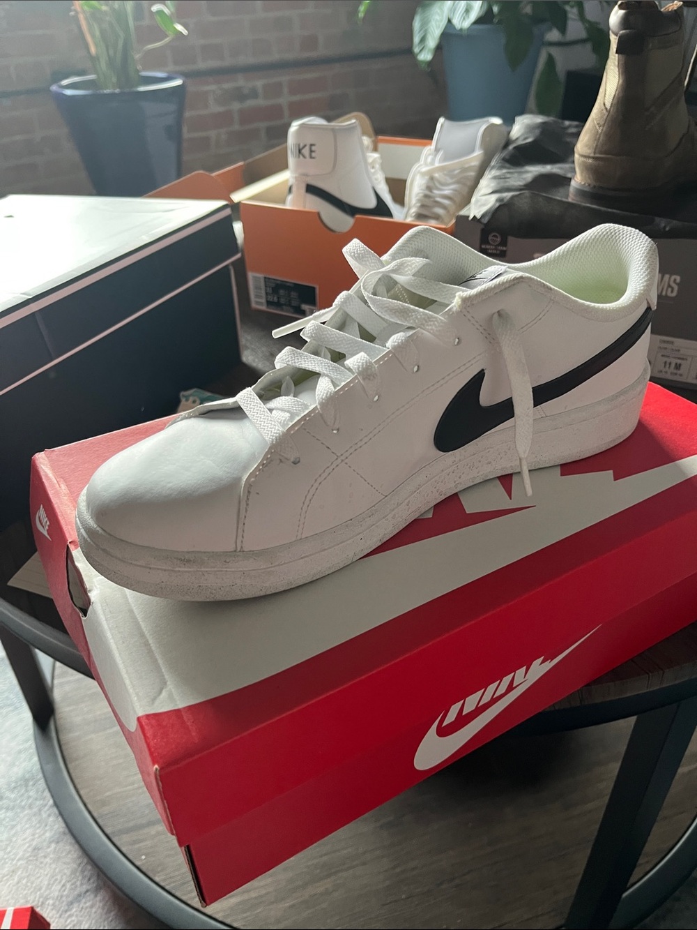 Nike Men’s White Low-Top Sneakers with Black Swoosh Accent